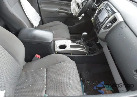 2015 Toyota Tacoma Base V6 z USA, uszkodzony, nr VIN 3TMLU4EN8FM186387